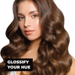 Woman with wavy brown hair on a white background with text 'Glossify Your Hue'.