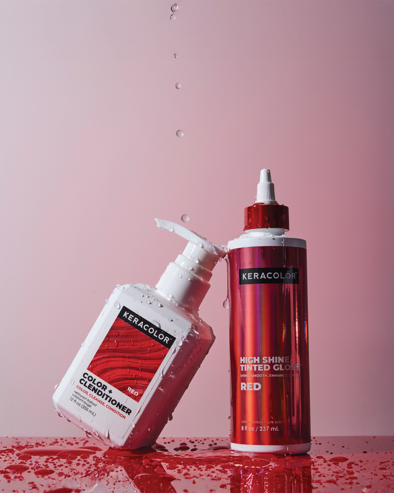 Two bottles of Keracolor hair color on a pink background