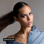 Woman with blue eye makeup wearing a denim jacket on a gray background, with 'Keracolor' branding.