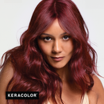 Woman with vibrant red hair against a white background, featuring the Keracolor logo.